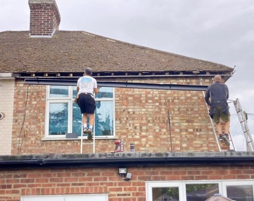 New black uPVC fascias soffits guttering and downpipes fitted to a property in Newmarket Road Cambridge