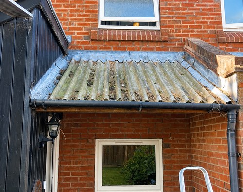Old leaking fibreglass roof before replacement at a property in Cambridge