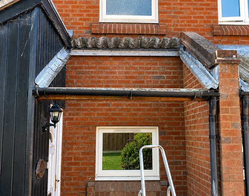 Old fibreglass roof removed ready for a new polycarbonate roof in Cambridge